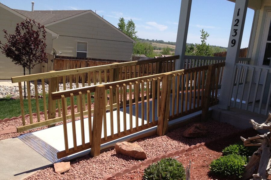 Exterior wheel chair ramp to complement landscaping.